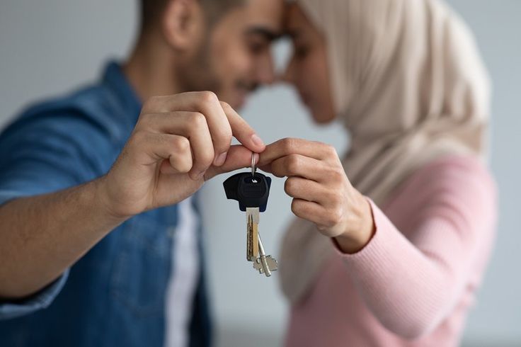 Handing over house keys after sale