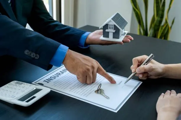 Real estate agent showing home contract